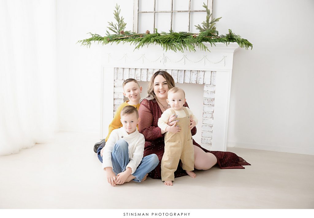 Mother and her 3 boys at a family photo shoot.