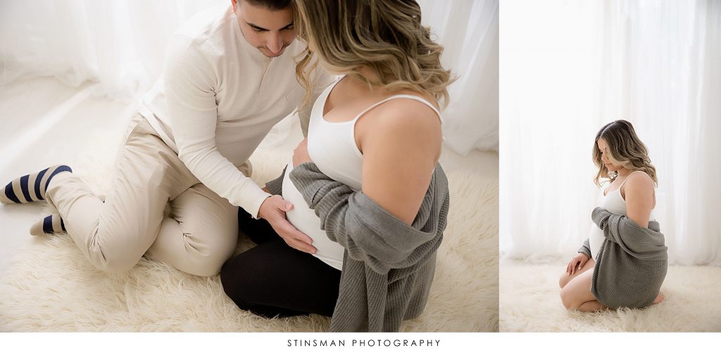 Parents to be snuggling at their maternity photoshoot