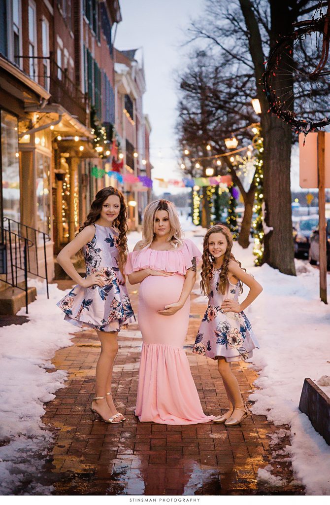 Mom and her daughters during maternity photoshoot