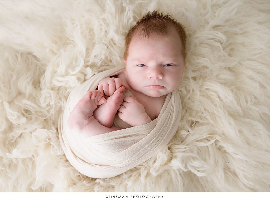 Newborn baby awake at his newborn photoshoot