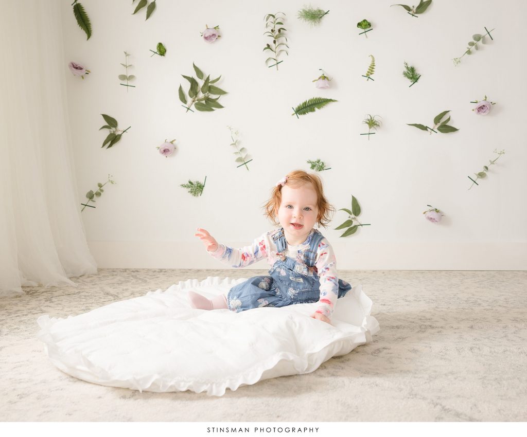 Little girl posed at her spring mini photoshoot