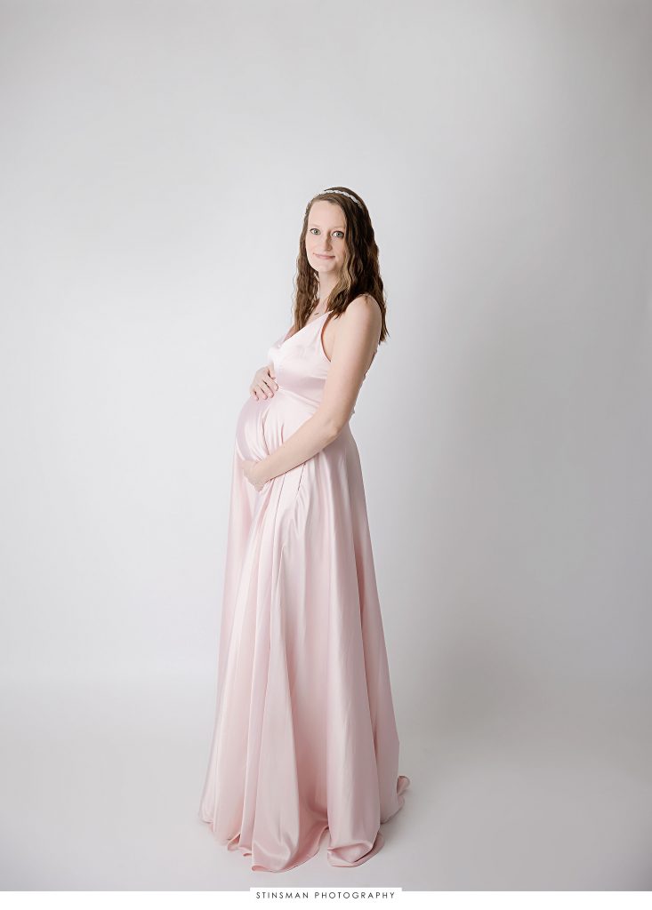 Pregnant mom posing at her maternity session