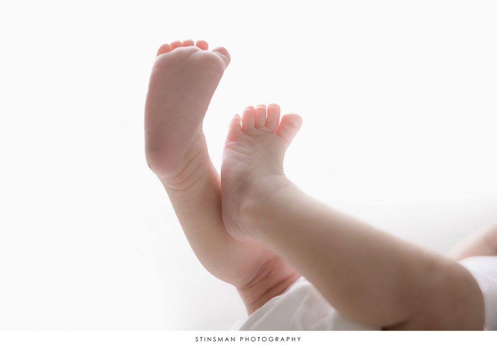 Newborn baby girl's feet from her newborn photoshoot