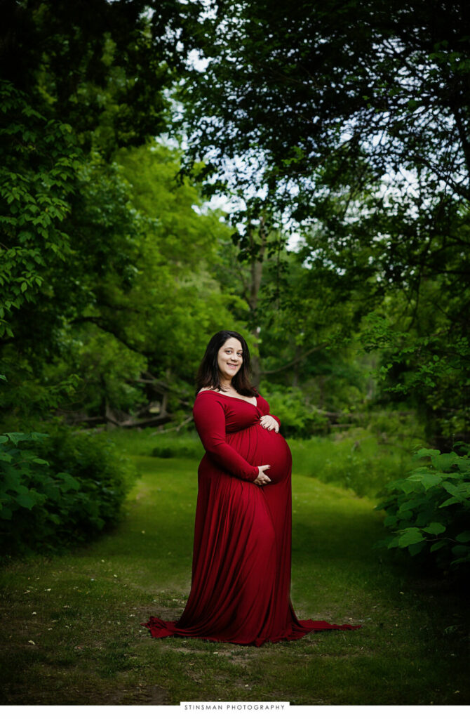 Mom to be posing at her maternity photoshoot
