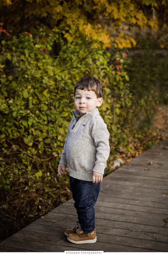 Little boy posing at his family photoshoot
