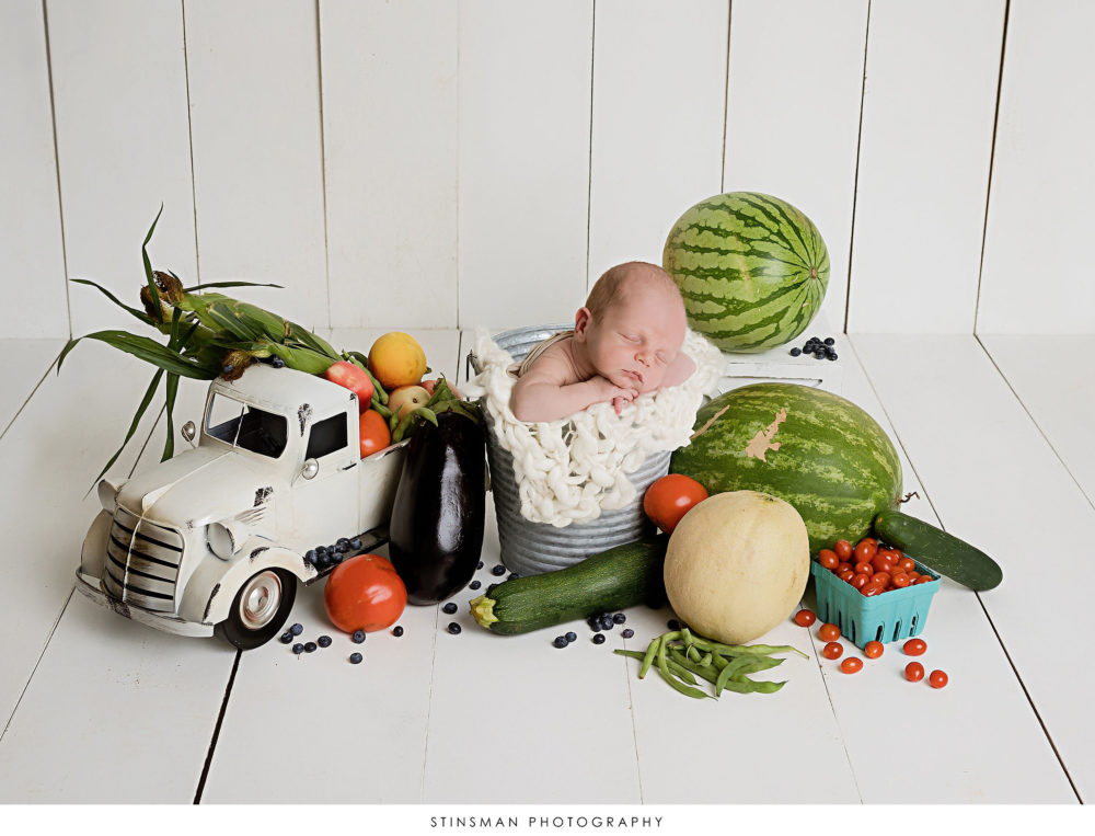 Newborn baby posed at his newborn photoshoot