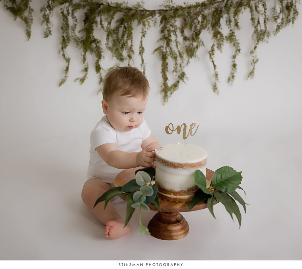 One year old posing at his milestone photoshoot