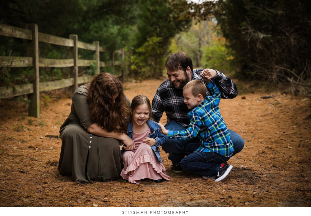 Family playing together at their family photoshoot