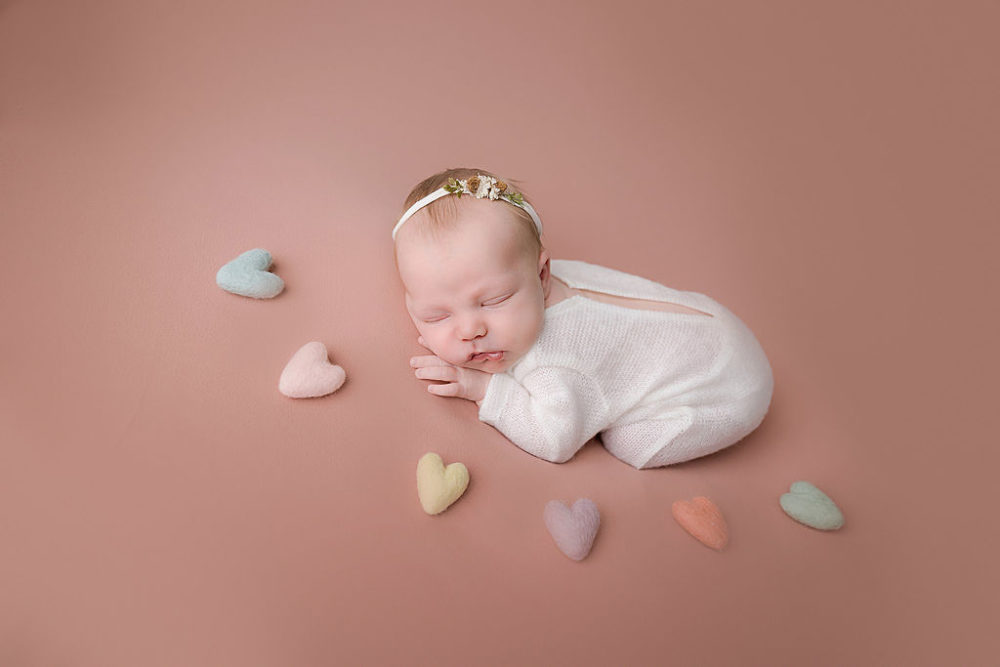3 month newborn baby with headband with mauve and cream newborn session in South Jersey