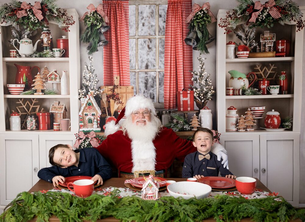 Laughing children with Santa in picture studio in eastampton NJ